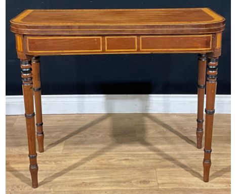 A George III satinwood crossbanded mahogany card table, folding top above a deep frieze, rosewood crossbanded and outlined th