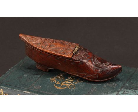 A 19th century chip-carved novelty snuff box, as a shoe, hinged cover, 11.5cm long