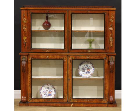 A Sheraton Revival satinwood and painted library bookcase, pierced three-quarter gallery above a pair of glazed doors enclosi