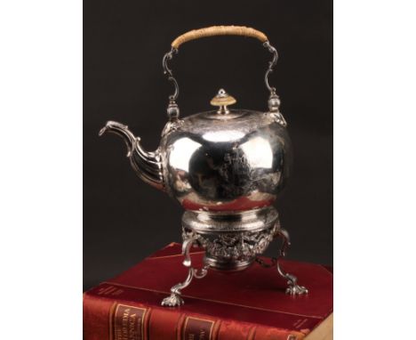 A George II silver globular tea kettle on stand, chased and cast in the Rococo taste with shells, flowers, scrolling leaves, 