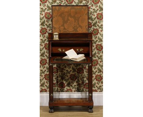 A 19th century French gilt metal mounted mahogany fireside escritoire or writing desk, of small and neat proportions, in the 