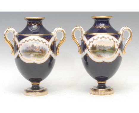 A pair of Mintons named view two-handled ovoid pedestal vases, painted with Windsor Castle and Alton Towers, verso with flowe