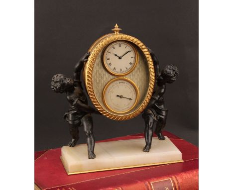 A 19th century French desk clock barometer, oval gilt case with silver dial clock above conforming aneroid barometer, raised 