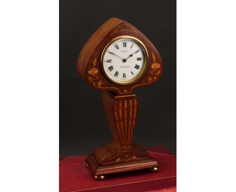 An Art Nouveau mahogany and marquetry mantel clock, of organic form, 8cm dial inscribed SANDERS STREATHAM, Roman numerals, 31