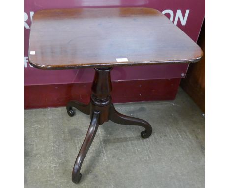 A Victorian mahogany rectangular tilt top tripod tea table 