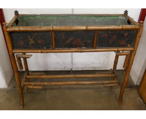 A Victorian bamboo and black chinoiserie lacquered planter 