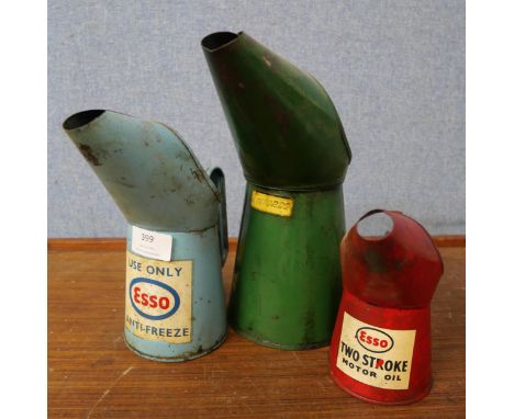 Three Esso oil cans 