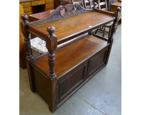 An Victorian carved mahogany two tier buffet 