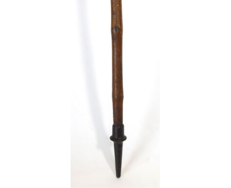 Sporting: A Large Otter Hunting Spear, circa 1900, the long ribbed wooden pole, fitted with a large metal seat point, stamped