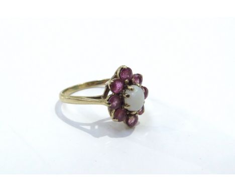 A 9ct gold ruby and opal cluster ring. Size K/L, 2.1g