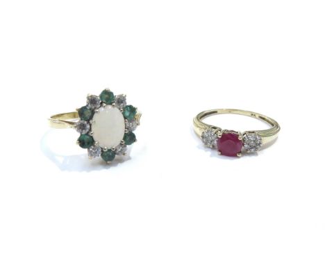 A 9ct gold ruby and diamond ring, size M/N and a 9ct gold opal, emerald and white stone ring, size R, 4.2g