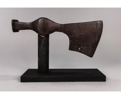 Ca. 900 AD, Superb Viking iron battle hammer and axe head; expertly cleaned and conserved, mounted on a custom made stand; H: