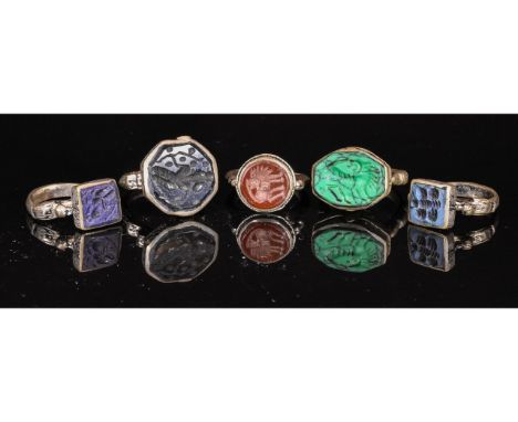 Ca.19TH - 20TH C AD. Wearable collection of Post Medieval Tribal / Yemeni white metal intaglio rings with multiple depictions
