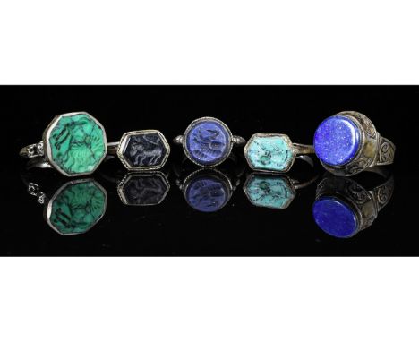 Ca.19TH - 20TH C AD. Wearable collection of Post Medieval Tribal / Yemeni white metal intaglio rings with multiple depictions