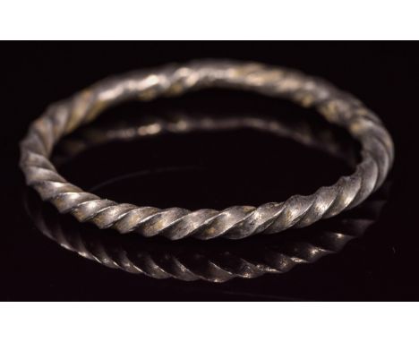 CA. 900 AD Rare Viking period silver ring; composed of a single twisted rod. Good, wearable condition; D: 23mm/W:28mm;2.5gr; 