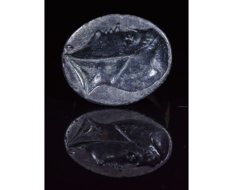 ca. 400 BC. Large Greek finger ring with; intact, well-repaired band; forming a huge elliptical-shaped bezel with a royal por