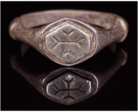 CA. 1200 AD Rare Crusaders period silver ring; composed of an oval-shaped hoop forming a well-preserved bezel; engraved with 