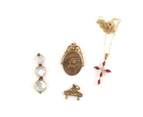 Ruby and diamond cross pendant in 14 ct on a 14 ct fine chain, together with a spinner pendant charm, a moonstone pendant and