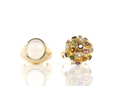 Single stone moonstone ring, set with an oval cabochon cut moonstone measuring 14.1 x 11.7 x 6.1mm, in a wide tapering band i