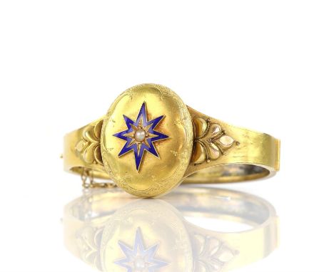 Victorian locket bangle, central oval hinged locket panel, set with blue enamel star on the lid with a centrally set seed pea