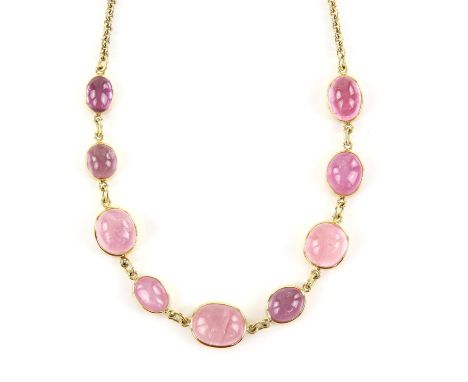 Pink tourmaline gold necklace by Cassandra Goad, set with nine oval cabochon cut pink tourmalines, largest tourmaline estimat