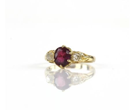Three stone ruby and diamond ring, oval cut ruby weighing an estimated 1.45ct, with an old cut diamond each side weighing an 