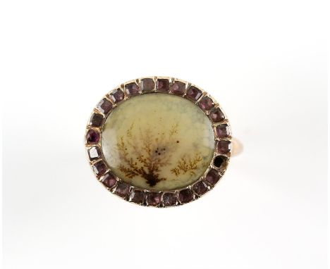 Georgian moss agate ring, central moss agate panel 13 x 11mm, set with a border of amethysts, set in closed backs, mounted in