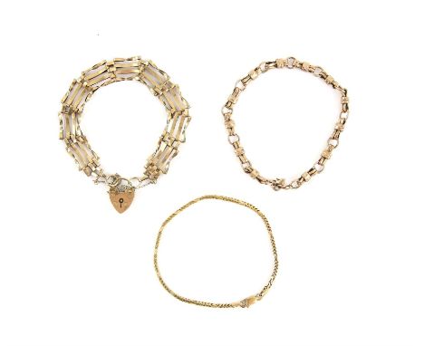 Three gold bracelets, including a vintage gate bracelet, hallmarked 9 ct London 1977, length 20cm, a fancy foxtail link brace