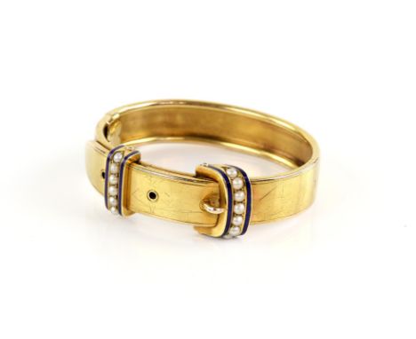 Victorian buckle bangle, set with blue enamel and seed pearls, with a concealed clasp and hinge, attached safety chain, in 15