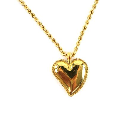 Gold heart pendant, designed as a puffed witches heart, in 14 ct, on a rope chain, hallmarked 9 ct, with import marks for She