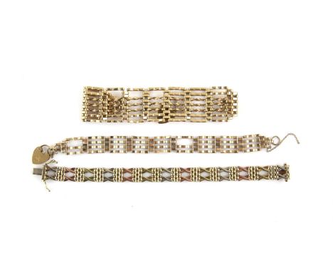 Three vintage gate link bracelets, one wide link bracelet, width measuring 2.6cm, with a heart padlock clasp and safety chain