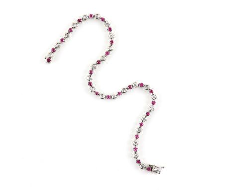 Ruby and diamond bracelet, set with twenty six claw set round cut rubies, estimated total ruby weight 1.30 carats, alternatel