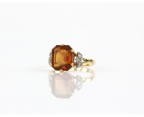 Citrine and diamond dress ring, central rectangular step cut citrine, estimated weight 3.59 carats, with decorative single cu