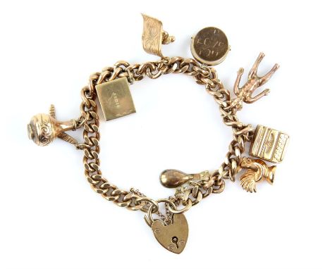 Vintage charm bracelet, flat curb links with a heart padlock clasp and safety chain, with nine charms, including a boomerang,