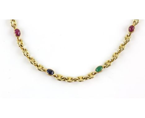 Anchor link chain, with cabochon cut rubies, sapphires and emeralds spaced throughout, in 18 ct yellow gold, with a spring ri