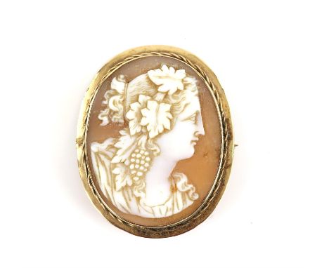 Antique cameo brooch, carved shell cameo depicting a portrait of lady in profile, with leaves and grapes in her hair, in a te