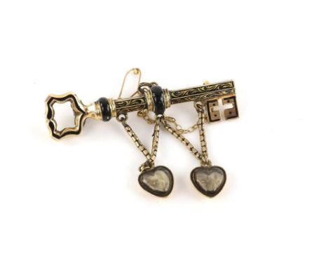 Victorian key brooch, with black enamel floral detailing, two suspended heart lockets containing flower shaped hair work, in 