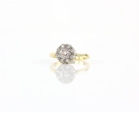 Diamond cluster ring, set with round brilliant cut diamonds, estimated total diamond weight 0.32 carats, mounted in 18 ct yel