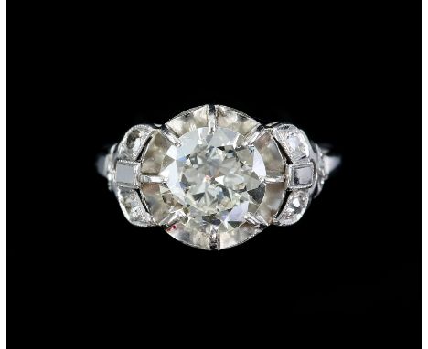 Mid 20th C single stone diamond ring, transitional cut diamond, weighing an estimated 2.30 carats, in a high floral setting, 