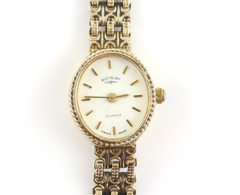 Rotary, a ladies gold case watch, oval dial with baton hour markers, quartz movement, in a 9 ct yellow gold case and integrat