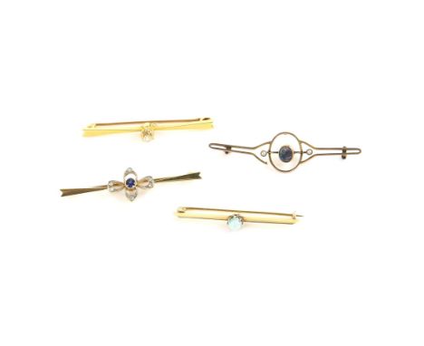 Four bar brooches including a single stone, old cut diamond, weighing an estimated 0.57ct bar brooch, a single round cabochon