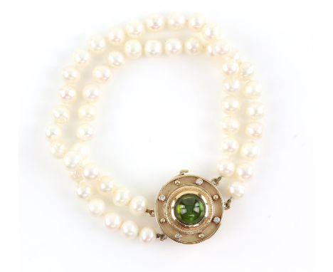 Contemporary double row freshwater pearl bracelet by Cassandra Goad, strung with knots, with interchangeable clasp, centrally