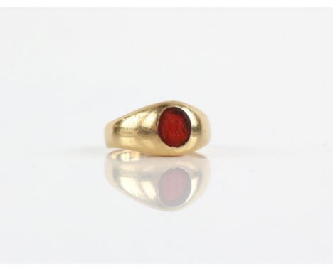 Vintage signet ring, set with a red glass seal, in 18 ct, ring size J1/2Condition Report:  Gross weight approximately 4.3 gra