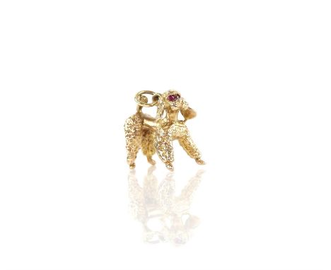 Poodle pendant charm with synthetic ruby eyes in 18 ct, with textured and polished gold detail, measures 22 x 21mmCondition R