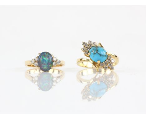 Two gem set rings, including a turquoise and diamond dress ring, with a central oval cabochon cut turquoise measuring 9.5 x 8