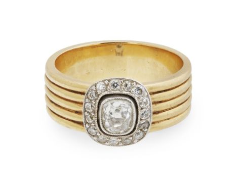 A diamond set cluster ring, Robinson Pelhammillegrain set with an old cushion cut diamond in a single border of round cut dia