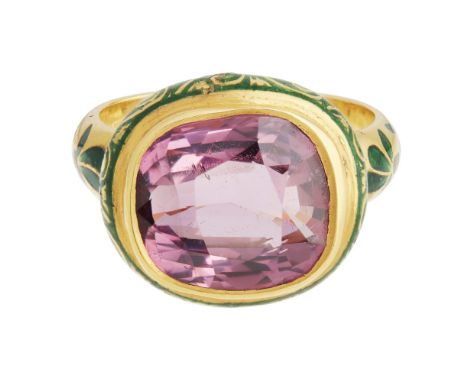 An Indian spinel set and enamelled ringcollet set with a cushion cut pink spinel, to a border of translucent green enamel scr
