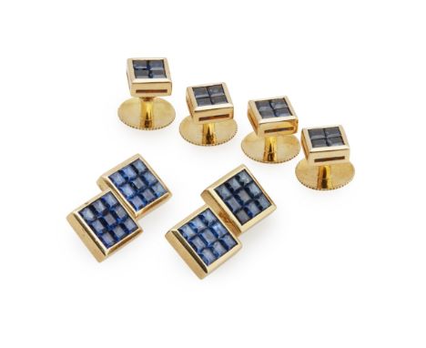 An 18k gold gentleman's sapphire set dress setcomprising a pair of cufflinks and four dress studs, each panel mystery set wit