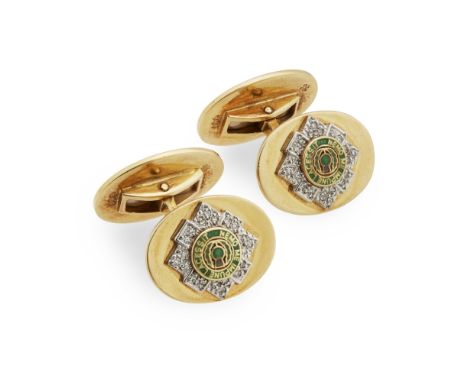 A pair of gentleman's diamond set 18k gold cufflinksthe principal terminal of oval outline, with applied green enamel and eig