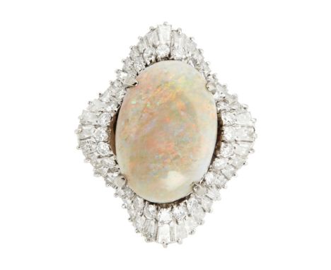 A mid-20th century opal and diamond set cluster ringclaw set with an oval opal cabochon in a ballerina surround, claw set wit
